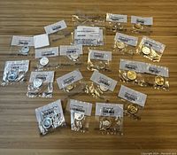 Overview of sealed uncirculated quarter coins arranged on a wooden surface