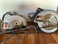 Two Skilsaw circular saws side by side, showing overall condition and blade size.