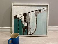 Front view of the original acrylic abstract painting on canvas by June Holiday, including a size reference blue cup.