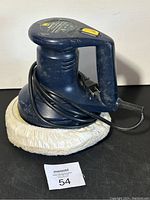 Blue Wen 8CT 8 orbital waxer with attached white polishing pad and electric cord wrapped around the base.