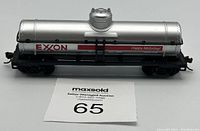 Front-side view of HO scale Exxon tanker train car showing branding and detail on tank.