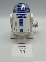 Front view of Star Wars R2D2 USB desktop vacuum showing detailed design and attached USB cable.