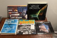 Five architectural design books laid flat showing front covers including titles and cover images.
