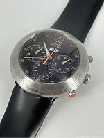 Oblique front view of watch face and leather strap