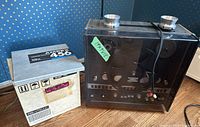 Revox tape machine next to Ampex tape box