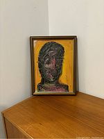 Front view of framed oil painting showing entire artwork.