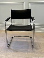 Front view of chair showing full design and condition