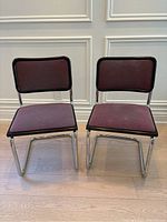 Front view of both chairs showing overall style and matching condition