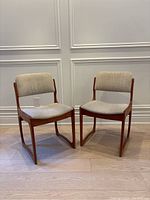 Pair of chairs front view showing design and upholstery