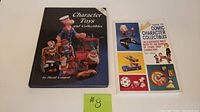 Front view of both books: 'Character Toys and Collectibles' hardcover and 'Guide to Comic Character Collectibles' softcover, with colorful cartoon character illustrations on covers.