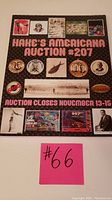 Front cover of Hake's Americana Auction Catalog #207, featuring multiple Americana-themed badges and collectible images along with auction dates and title.