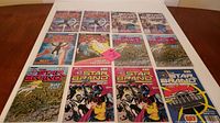 Twelve Marvel Comics The Star Brand comics laid out, showing front covers featuring cosmic and character-themed artwork.