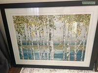 Framed landscape print of birch trees with yellow-green leaves and blue-green background.