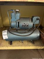 Front view of entire compressor and tank