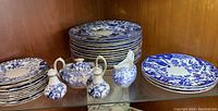 Shelf display of all plates and serving pieces