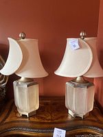 Full view of the pair of lamps showing height, base, and lampshades