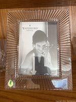 Front view of the rectangular Waterford crystal picture frame showing diagonal ribbed texture and Waterford Crystal logo sticker.