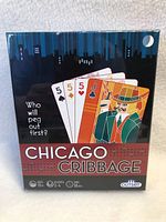 Front sealed box of Chicago Cribbage game showing title, artwork, and player info