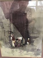 Close-up photo of the watercolor painting showing two women near a large wooden door with stone wall background, signed by the artist at lower left.