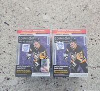 Front view of two sealed O-Pee-Chee Platinum 2020-21 NHL hockey trading card blaster boxes showing packaging artwork and details.