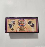 Photo shows the sealed box of 1991-92 Upper Deck NBA basketball cards. The box displays the Upper Deck logo, NBA Basketball branding, and images of basketball player cards on the front.