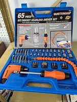 Mastergrip 65-piece bit/socket gearless driver set with flexible extension and orange-black driver.