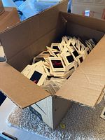 Box filled with various photographic slides mostly from the 1970s and 1980s with some older