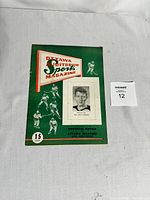 Single vintage sports magazine with green cover, titled 'Ottawa Auditorium Sports Magazine', featuring Montreal Royals and Ottawa Senators QHL hockey semi-finals, with a black and white photo of Bill (Red) Johnson on front cover.