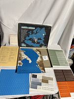 Overview of game box, map boards, terrain effects chart, and four sheets of counters