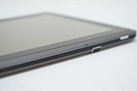 Side angle showing the thickness and side edge of the tablet.