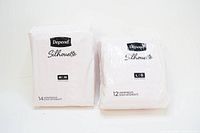 Two sealed packs of Depend Silhouette women's underwear, one medium size with 14 pieces and one large size with 12 pieces.