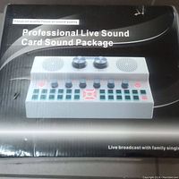 Photo of the factory packaging box showing the product image and name 'Professional Live Sound Card Sound Package'