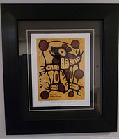 Framed print showing entire artwork and black frame.