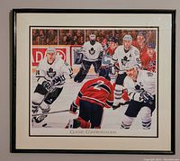 Framed print showing full view of the artwork with players and the 'Classic Confrontation' title below.