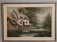 Front view of large oil painting depicting a rural cottage by a pond with ducks, showing overall artwork and frame.