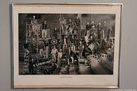 Framed lithograph showing 1995 Montreal Canadiens team in a black and white photo titled 'Le Nouveau Forum'.