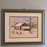 Full frontal image of the framed watercolour painting showing winter cabin scene and tree