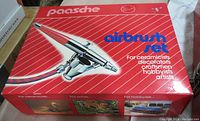 Photo of the Paasche airbrush set box showing brand name and airbrush image on lid