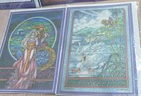 Two vintage art cards: one depicts a woman in a flowing gown with a croquet mallet and the other shows swans and ducklings on a lake surrounded by decorative borders.