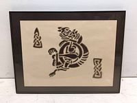 Full view of framed Celtic style mixed media art, showing the entire composition with animal designs and smaller knot patterns.