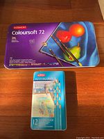 Photo of the closed tin for Derwent Coloursoft 72 pencils and closed tin of Derwent Watercolour 12 pencils.