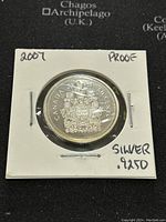 Obverse side of the 2007 Canadian silver proof 50 cent coin showing the Canadian coat of arms and text.