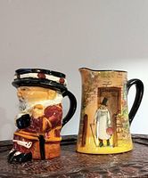 Side view showing details of Royal Doulton 'Gaffers' character jar holding pipe, and Staffordshire Shorter & Sons 'Beefeater' jar with a Beefeater figure standing at door.