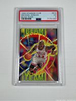 Front of PSA-graded trading card showing Michael Jordan in action with Beam Team holographic design and PSA label indicating 1995 Stadium Club #B14 EX 5