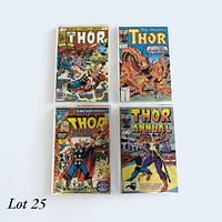 Four Thor comic books arranged on white background showing front covers including Annual and King-Size Annual