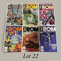 Photo of 6 ROM Spaceknight Marvel comics laid out on a flat surface, showing front covers with clear title text and colorful illustrations.