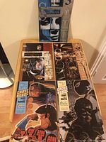 Full view of all five comics displaying The Sandman and Crossroads covers