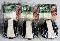 Three Roots extra small digital camera pouches, still in original plastic packaging, arranged side by side showing front with Roots branding and product label.