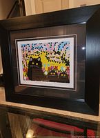 Front view of framed print showing full image and frame