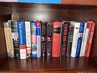 Shelf of hardcover history books focusing on U.S. presidents and political history, spine titles and authors visible.